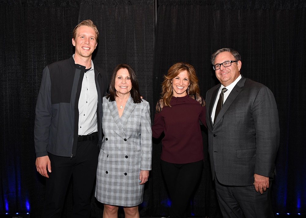 Stan and Roslyn with Nick Foles, former Philadelphia Eagles quarterback, as well as Suzy Kolber, former ESPN sports anchor and reporter Stan and Roslyn with Nick Foles, former Philadelphia Eagles quarterback, as well as Suzy Kolber, former ESPN sports anchor and reporter